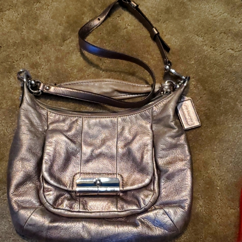 Coach soft gold bag.  Teal / green satin inside. Quality Feel.